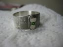 [diopside in silver with liver of sulfur (size 8)]