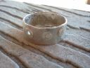 [silver rivet ring]