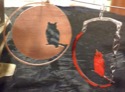 [copper owls, one enameled]